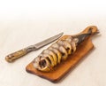 Mackerel smoked chopped to pieces on a cutting board Royalty Free Stock Photo