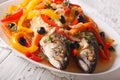 Mackerel in vegetable marinade close-up on the table. horizontal Royalty Free Stock Photo