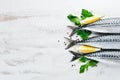 Mackerel on a white wooden background. Raw fish