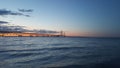 Mackinac bridge on the water sunset Royalty Free Stock Photo