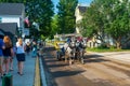 Mackinaw Island, MI - July 14, 2021: Horse drawn carriage on Mackinac Island, MI on July 14, 2021.