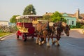 Mackinaw Island, MI - July 14, 2021: Horse drawn carriage on Mackinac Island, MI on July 14, 2021. Royalty Free Stock Photo