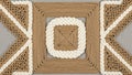 Macram design featuring a symmetrical pattern with alternating tan Royalty Free Stock Photo