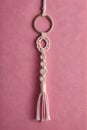 Macrame keychain isolated on bright background Royalty Free Stock Photo