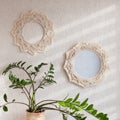 Macrame mirror and wreath on a white wall. Eco-style. Natural materials