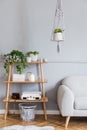 Macrame plant hanger in Scandinavian home interior.