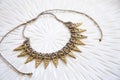 Waxed string necklace with brass components