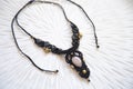 technique waxed string necklace with gemstone rose quartz Royalty Free Stock Photo