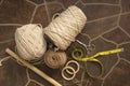 MacramÃÂ© still life - group of cords and threads with scissors and measure tape including wood elements to handcraft macrame home