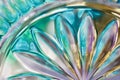 Macro abstract art background of beautiful lead crystal glass reflecting brilliant turquoise color