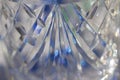 Macro abstract art background of diamond pattern fine lead crystal glass with blue and white bokeh Royalty Free Stock Photo