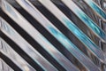 Macro abstract background of beautiful diagonal cut lead crystal glass texture reflecting blue and silver color