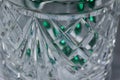 Macro abstract background of a beautiful vintage hand-cut lead crystal glass jar with diamond shape cuts Royalty Free Stock Photo