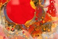 Macro Abstract circle bubble texture marble background. Acrylic gold and red color in water and oil