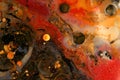 Macro Abstract circle bubble texture marble background. Acrylic gold and red color in water and oil