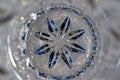 Macro abstract texture of sparkling lead crystal glass with a starburst pattern