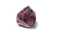 Macro of Alexandrite mineral stone in rock on white background