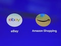 Macro of ebay and amazon shopping apps on smartphone display