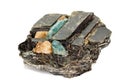 Macro aquamarine mineral stone in rock on white background