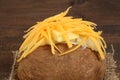 Macro baked potato with cheese and butter