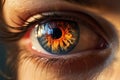 Macro of beautiful brown eye of a female person with burning glowing fire in iris Royalty Free Stock Photo