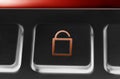 Macro Of A Black Button With Red Opened Security Lock Icon And Backlight Royalty Free Stock Photo