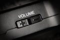 Macro Of black Volume Buttons rocker Of A black handy audio device