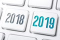 Macro Of 2 Buttons With The Year 2018 And 2019 On White Keyboard