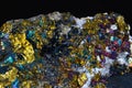 Macro of a Chalcopyrite with beautiful colors and small crystals also called Kupferkies