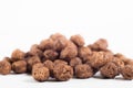 Macro of chocolate cereal in white background Royalty Free Stock Photo
