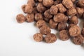 Macro of chocolate cereal in white background Royalty Free Stock Photo