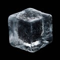 Macro Clear Ice Cube with Crystals and Bubbles on Black Background Royalty Free Stock Photo