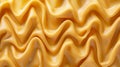 Macro close up of caramel swirl background with smooth lines, liquid caramel texture
