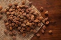 Macro Close-up of chana or chickpea Cicer arietinum or whole white Bengal gram dal cleaned on Jute mat and wooden