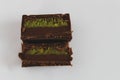 macro close-up of dubai chocolate with pistachio center halved and stacked Royalty Free Stock Photo