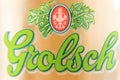 Macro closeup of dutch grolsch beer logo.