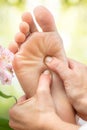 Macro close up of foot massage. Royalty Free Stock Photo