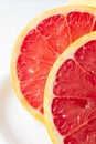 Macro close up of half a red grapefruit with selective focus, Royalty Free Stock Photo