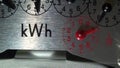 Macro close-up of a household kWh electric meter.