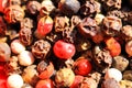 Macro close up of isolated pile with mixed peppercorns Royalty Free Stock Photo