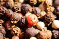 Macro close up of isolated pile with mixed peppercorns Royalty Free Stock Photo
