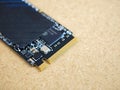 Macro close up of an M.2 NVME ssd edge connector with gold fingers on PCB modern PCI-e solid state storage module detail, computer Royalty Free Stock Photo