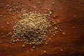 Macro close-up of Organic Ajwain seed Trachyspermum ammi or thymol seeds on wooden top background. Pile of Indian Aromatic Spice Royalty Free Stock Photo
