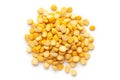 Macro Close-up of Organic Bengal Gram Cicer arietinum or split yellow chana dal cleaned on a white background.