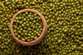 Macro Close up of Organic green Gram Vigna radiata or whole green moong dal in an earthen clay pot kulhar on the . Royalty Free Stock Photo