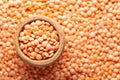 Macro Close up of Organic masoor dal Lens culinaris or whole pink dal in an earthen clay pot kulhar on the self background