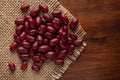 Macro Close-up of Organic Rajma,  Laal Lobia  or red kidney beans dal cleaned on Jute mat and wooden Royalty Free Stock Photo