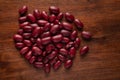 Macro Close-up of Organic Rajma,  Laal Lobia  or red kidney beans dal cleaned on wooden top background. Royalty Free Stock Photo