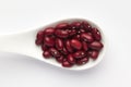 Macro Close-up of Organic Rajma,  Laal Lobia  or red kidney beans dal on a white ceramic soup spoon. Royalty Free Stock Photo