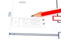 Macro close up of quantity surveyors hand reviewing technical drawing. Architect working on blueprint